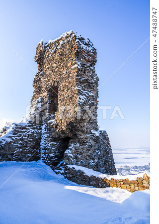 Ruins of medieval castle Lichnice near Tremosnice, Czech Republic. Sunny snowy winter day 47488747