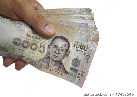 Hand holding a lot of 1,000 Baht Thailand banknote Hand holding a lot of 1,000 Baht Thailand banknote 47492549