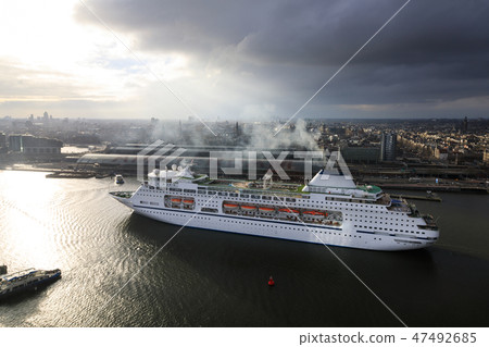 Large cruise ship in the harbor of Amsterdam 47492685