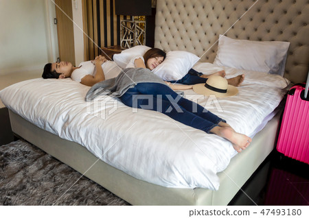 Asian couple traveler tried to travel vacation together and slee 47493180