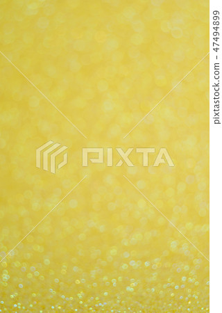 Abstract glitter yellow background Abstract glitter yellow background 47494899