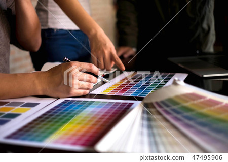 Graphic designers choose color from the color band 47495906