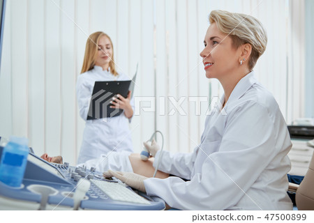 Women in hospital working to prevent illness. Women in hospital working to prevent illness. 47500899