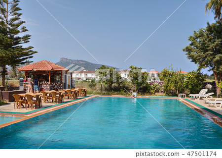 Swimming pool in open air, bar for hotel guests. Swimming pool in open air, bar for hotel guests. 47501174
