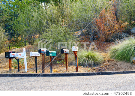 American mailboxes along roads. 47502498