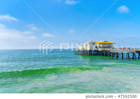 Famous Pier in Santa Monica with tourists 47502500