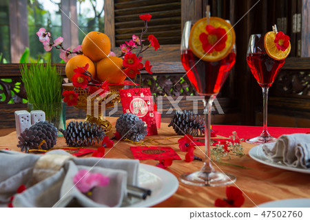 Chinese New Year party table in red and gold theme Chinese New Year party table in red and gold theme 47502760