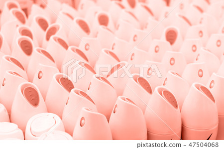Living Coral color of the Year 2019. Plastic caps with coral in trendy color Living Coral color of the Year 2019. Plastic caps with coral in trendy color 47504068