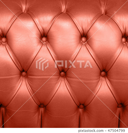 Living Coral color of the Year 2019. Leather Upholstery Background with coral in trendy color Living Coral color of the Year 2019. Leather Upholstery Background with coral in trendy color 47504799