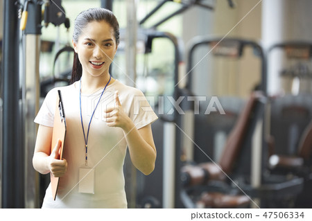 Female fitness gym staff Female fitness gym staff 47506334