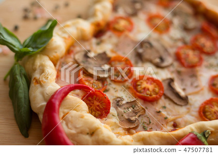 Pizza heart shaped on wood 47507781