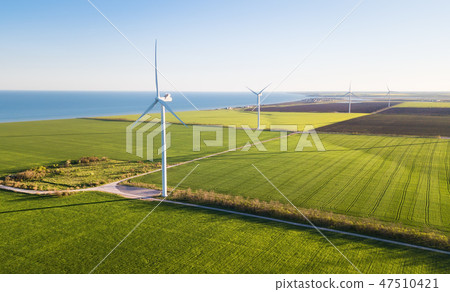 Wind power station on the field. Wind power station on the field. 47510421