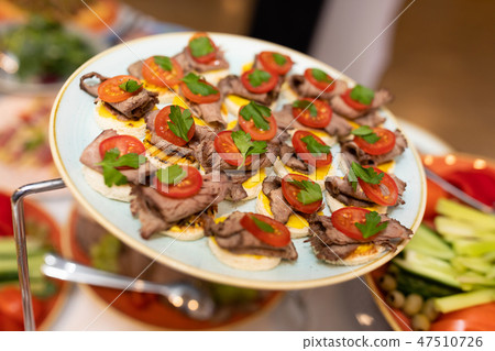Close-up of meat snacks on the custard pillow 47510726