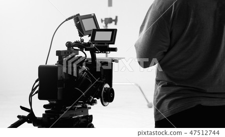 Behind video camera recording online commercial Behind video camera recording online commercial 47512744