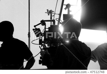 Behind video camera recording online commercial 47512748