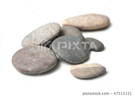 group of pebbles on white background 47513131