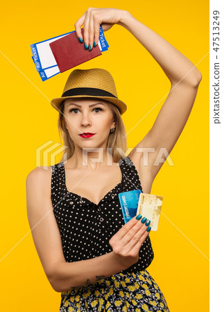 excited student holding pass ticket , credit card excited student holding pass ticket , credit card 47513249