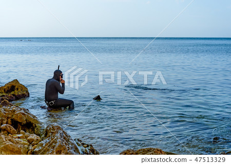 The diver before the dive The diver before the dive 47513329