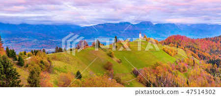 Wide panorama with church top hill, Slovenia Wide panorama with church top hill, Slovenia 47514302