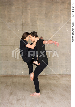 Casual couple of dancers in studio. Casual couple of dancers in studio. 47514348