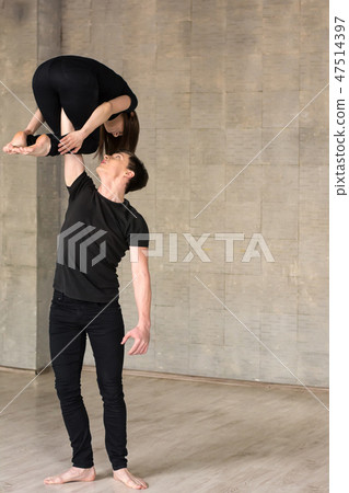 Couple dancing on wall background. Couple dancing on wall background. 47514397