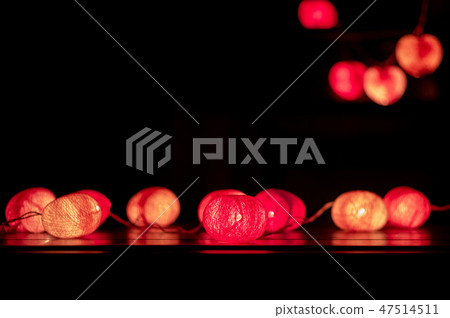 Closeup heart shape of led lights in dark room Closeup heart shape of led lights in dark room 47514511