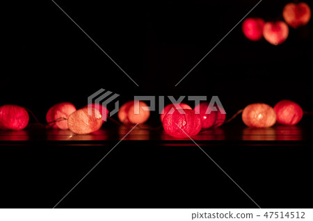 Closeup heart shape of led lights in dark room Closeup heart shape of led lights in dark room 47514512
