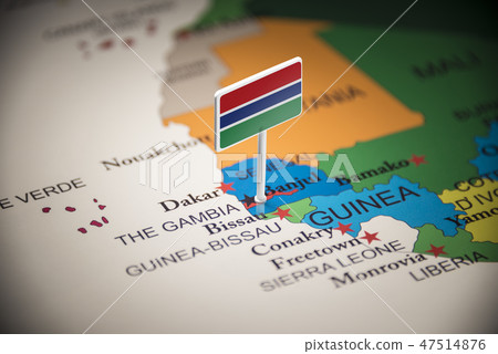 Gambia marked with a flag on the map 47514876