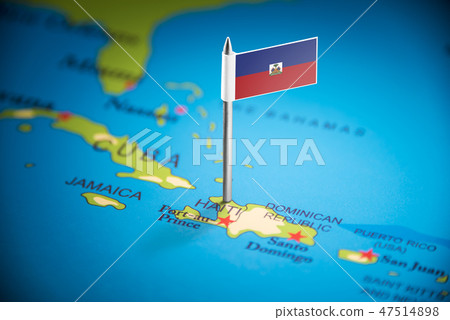 Haiti marked with a flag on the map 47514898