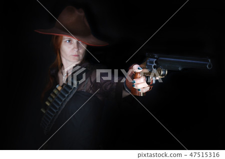 wild west girl with revolver gun 47515316