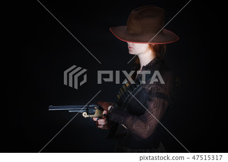 wild west girl with revolver gun 47515317