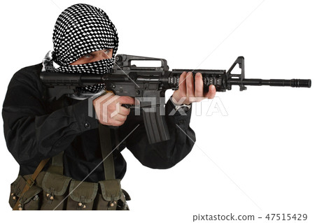 insurgent dressed in black uniform and black and white shemagh with m4 assault rifle 47515429