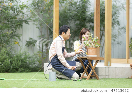 A couple doing gardening A couple doing gardening 47515632
