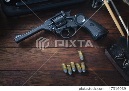 old retro vintage typewriter and revolver gun old retro vintage typewriter and revolver gun 47516089