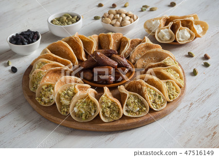 Arabian pancake stuffed with sweet cheese Arabian pancake stuffed with sweet cheese 47516149