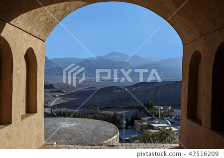 Rural landscape with mountains behind the archway 47516209