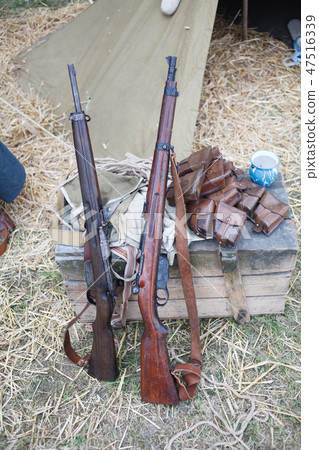 Rifles pyramids and helmets, First World War-era  47516339