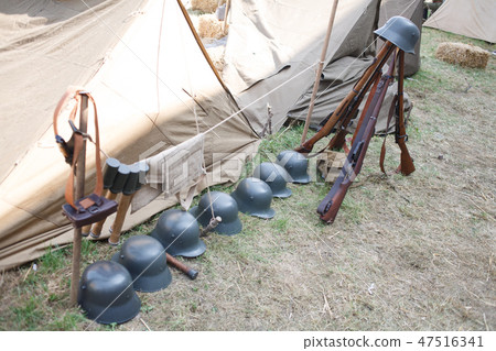 Rifles pyramids and helmets, First World War-era  47516341