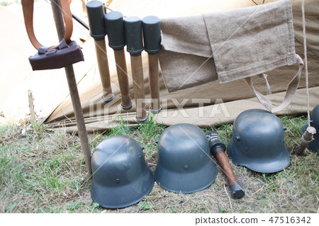 Rifles pyramids and helmets, First World War-era  47516342