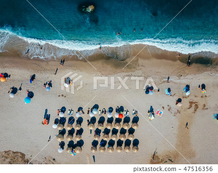 Beach with sun loungers on the coast of the ocean 47516356