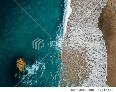 Aerial View From Flying Drone Of People Relaxing Aerial View From Flying Drone Of People Relaxing 47516358
