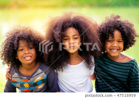 Happy kids group playing in the park in school. Happy kids group playing in the park in school. 47518959
