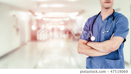 Young male doctor working at the hospital. Young male doctor working at the hospital. 47519069