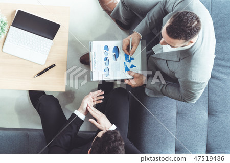 Businessmen are in business meeting in office. Businessmen are in business meeting in office. 47519486