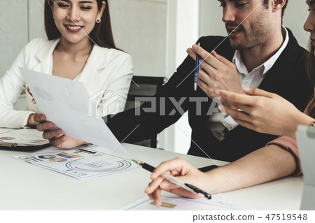 Businessman and businesswomen working in office. Businessman and businesswomen working in office. 47519548
