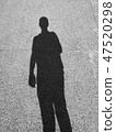 Shadow silhouette of a man on the floor. 47520298