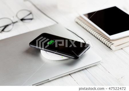 phone charging on wireless charger new technology 47522472