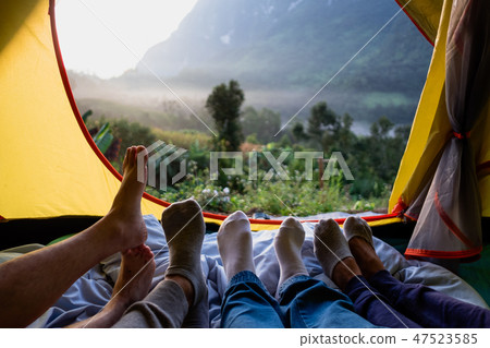 Close up foot of group of friends relax Close up foot of group of friends relax 47523585