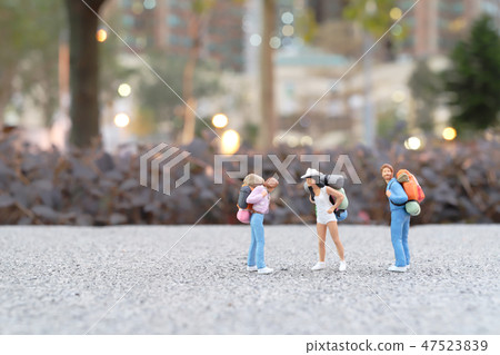 Mini of  Traveler with back pack walking 47523839