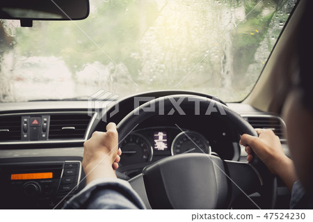 driving in rainy season 47524230